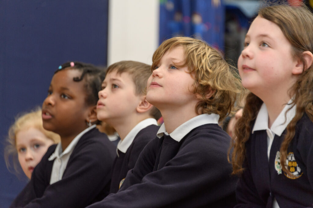 a group of students looking at something
