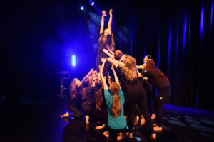 Students practicing their performance in the performing arts class