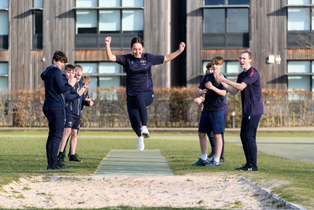 a picture of a student doing a long jump