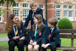 students outside talking and laughing