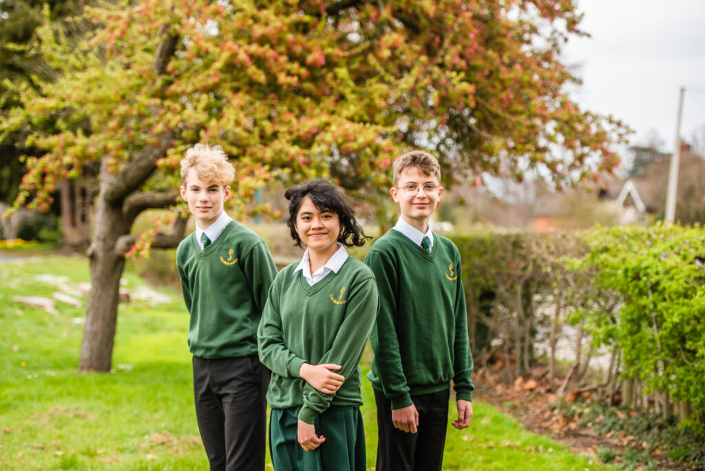 a picture of three students side by side